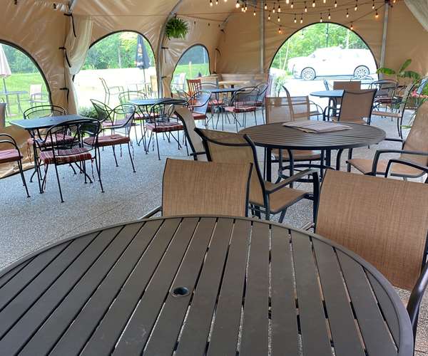Tented Outdoor Dinning. Great for Rehersal Dinners and Birthday parties